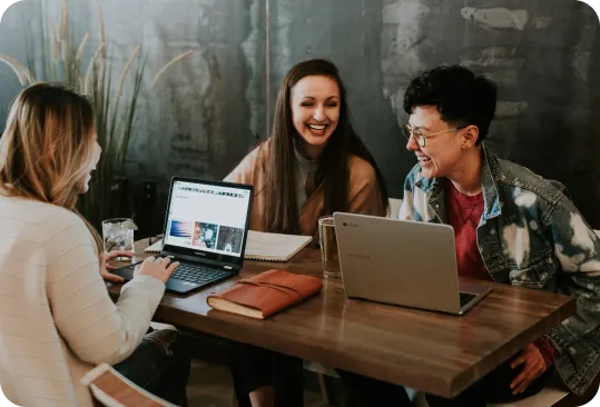 Overhead shot of a person typing on a laptop